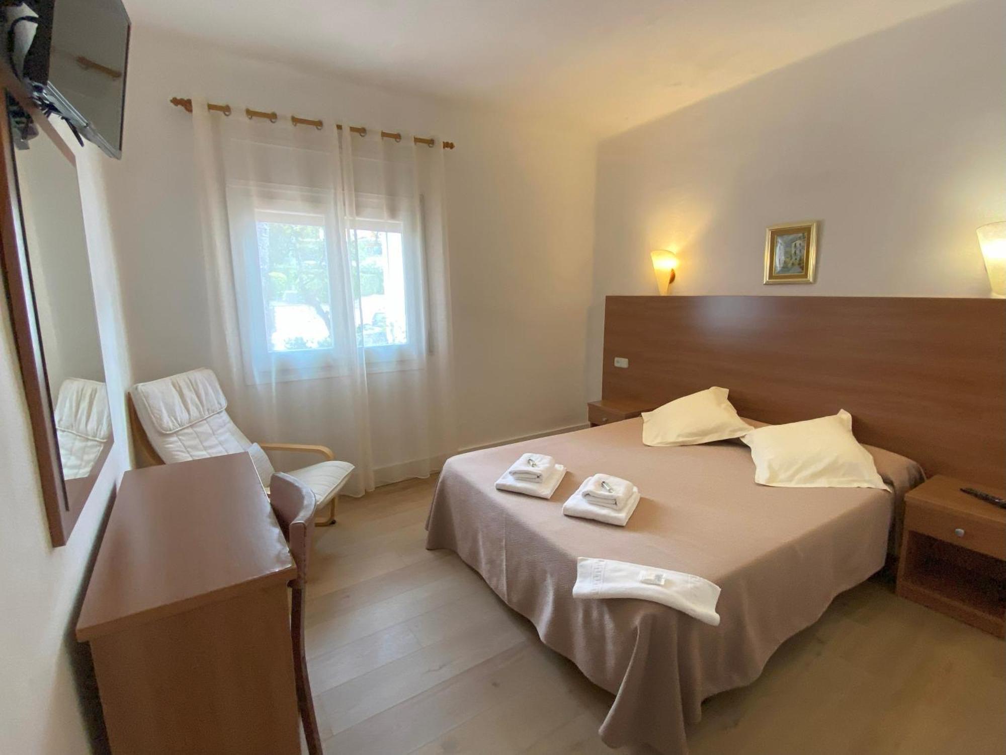 Hotel Medium Montecarlo Palafrugell Rom bilde